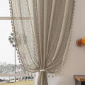 WAZZIO Boho Lace Curtains 63 Inches 2 Panel,Light Filtering Privacy Tassel & Geometry Crochet Semi Sheer Curtain Drapes for Bedroom Living Dining Room,Rod Pocket & Tassel,Earthy Color Taupe